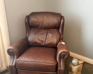 Traditional Brown Leather Recliner with Nailhead Trim and Tapered Wood Feet