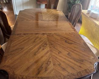 #14 - $950 - Thomasville dining table 68"L + 1 leave 20"x30Hx44W with 5 chairs & 1 arm - Burl walnut veneer
