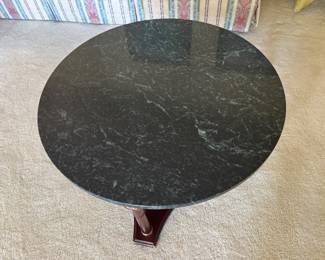 #42 - $140 -Marble top green round coffee table on columns 29x29x16