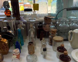 Assortment of vintage and antique bottles