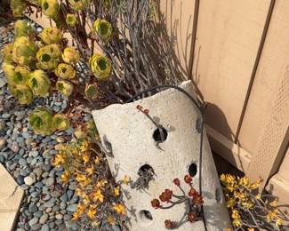 Concrete planter with succulents.
