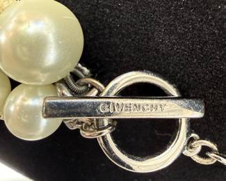 There are 3 sets of Givenchy statement necklaces