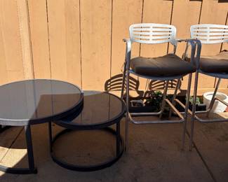 Outdoor tables and bar stools