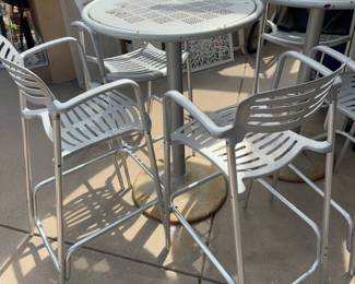 Aluminum chairs and heavy weighted high top tables
