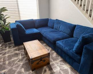 Vintage trunk and dark blue sectional