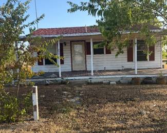 This house is $25000 but you have to move it off the property! 
