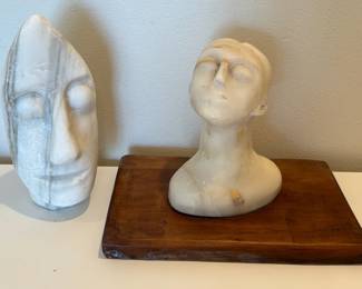 Carved Stone Face Sculptures