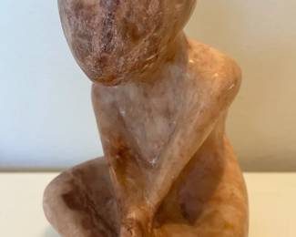 Carved Stone Sitting Figure