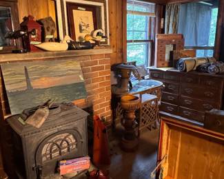 Wood stove, duck decoy, cedar chest, textiles, bar cart