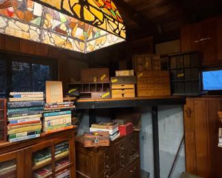 Antiques, Tiffany style chandelier, books, cupboards, wooden crates and boxes