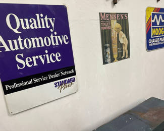 Lot 23: Vintage automotive advertising signs