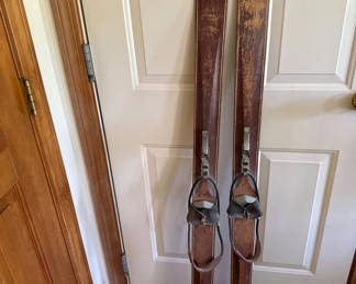 Lot 41: Vintage wooden skis with leather bindings