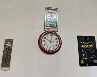 Lot 10: Vintage automotive and farm wall decor
