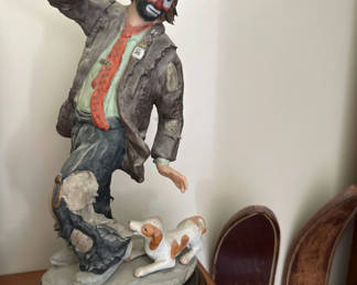 Lot 37: Figurine of a man with a dog