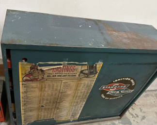 Lot 22: Vintage automotive parts cabinet with ignition and electrical components