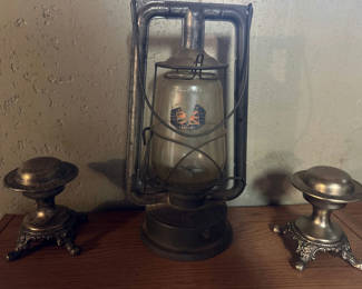 Lot 220: Vintage kerosene lantern with two whiskey decanter stands