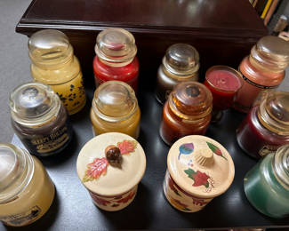 Lot 227: Assorted scented candles and decorative canisters
