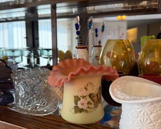 Top hat collection. Vaseline glass top hat with butterfly