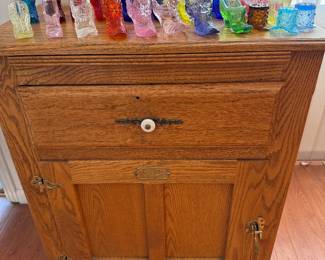 White Clad Ice box with glass shoe collection