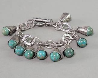 080 Lot 269 Sterling silver and turquoise charm bracelet