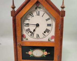 410 Lot 336 Mahogany and glass Cathedral style mantel clock