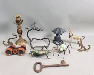349 Lot 301 Group of metal figurines, candlestick, wall