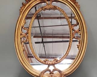 217 Lot 27 Italian gilt oval mirror