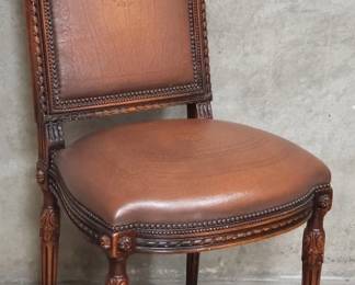 088 Lot 169 Theodore Alexanderstyle leather and walnut side