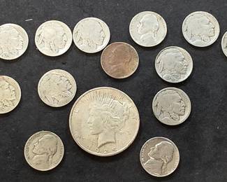 235 Lot 71u 1925 Peace silver dollar, 9 Buffalo nickels, and