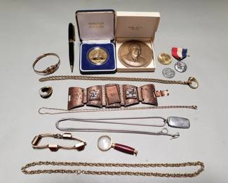 380 Lot 319 Group of costume jewelry, mechanical pencil,