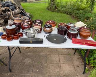Vintage bean pots with warmers on some and one with 4 cups