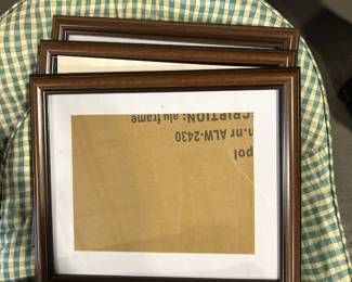 3 wooden picture frames with mats