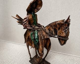 ar Papel Mache Sculpture of a Cowboy on Horseback