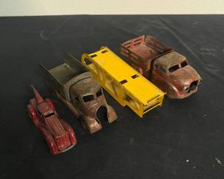 c Vintage Metal Toy Truck Collection Featuring Classic Red and Yellow Designs