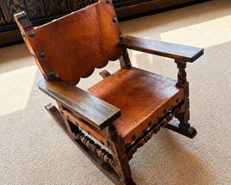 an Mexican Spanish Style Leather Rocking Chair