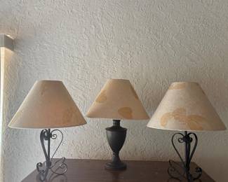f Set of Three Lamps with Unique Ironwork Bases and Beige Fabric Shades