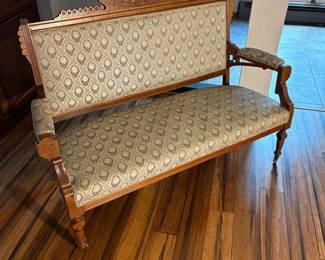 an astlake Victorian Carved Parlor Loveseat