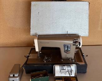 an Vintage Kenmore Sewing Machine Model 148.294 with Original Case and Accessories