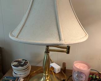 #047 Brass table lamp swivels 20" tall $25.00