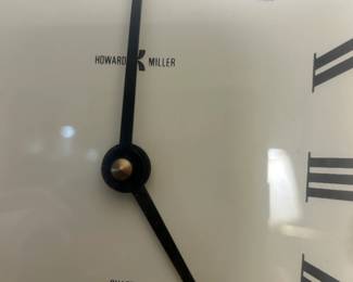 #037 Howard Miller wall clock battery operated 16x4x28 $75.00