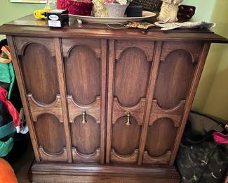 #035 Entry table with 2 doors and 1 shelf 30x13x30 $75.00