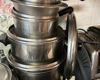 #108 9 piece reveral ware potts $40.00