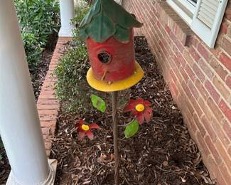 #138 metal birdhouse on stand $30.00