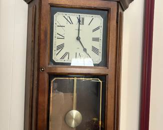 #037 Howard Miller wall clock battery operated 16x4x28 $75.00