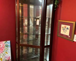 #028 Laminate and glass corner display cabinet 3 glass shelves front sliding door inside light 27x27x36 and 80" tall $120.00