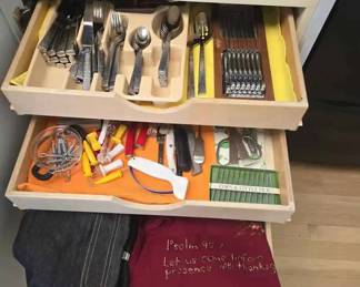 SM204Assortment Of Flatware And Serving Pieces