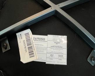 Nuevo Brand Sticker on Chairs