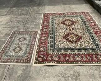 Two Traditional Style Area Rugs