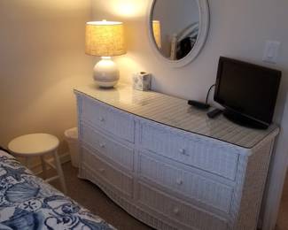 6-drawer wicker dresser; mirror; table lamp; TV