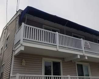 Navy awnings; vinyl railing